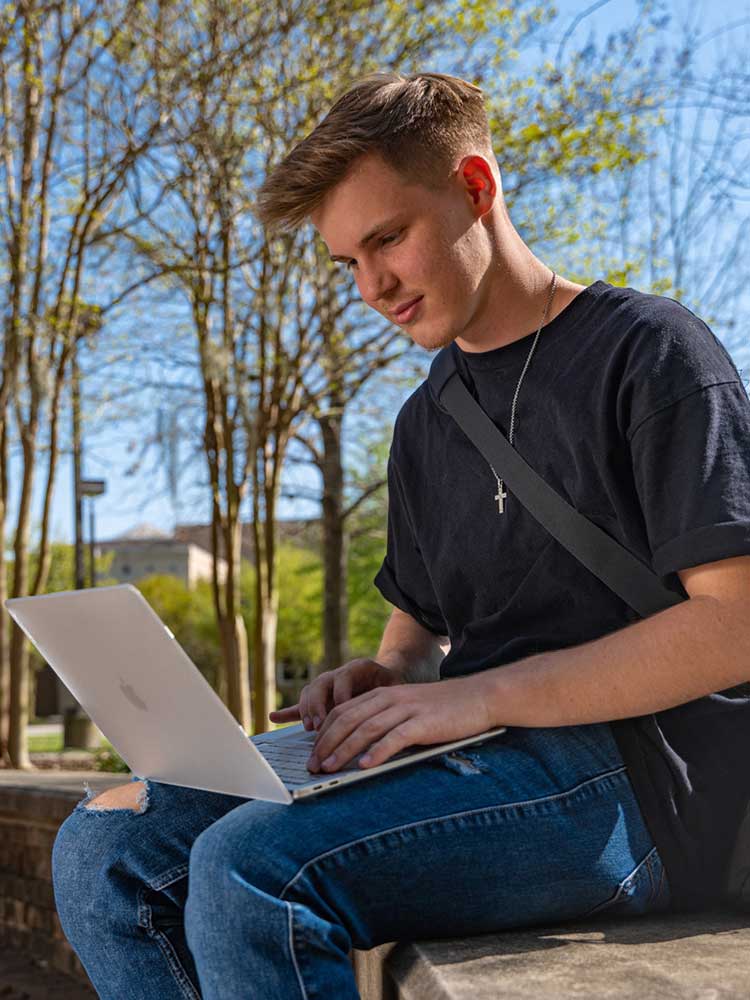 Student with laptop