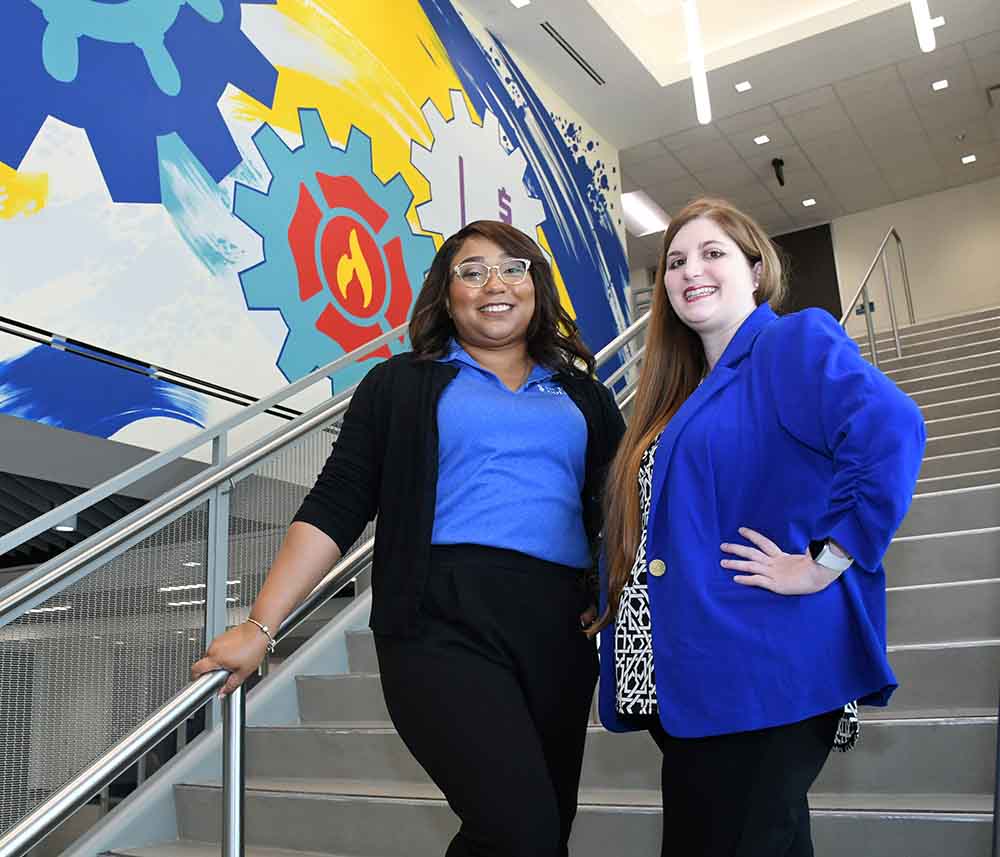 San Jacinto College staff members Dana Jenkins-Post and Samra Ward posing together, supporting neurodivergent students