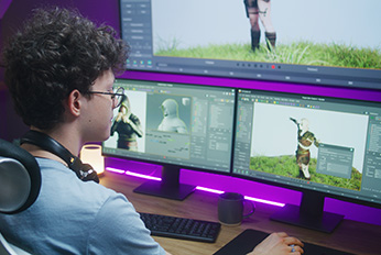 game design student working on a computer