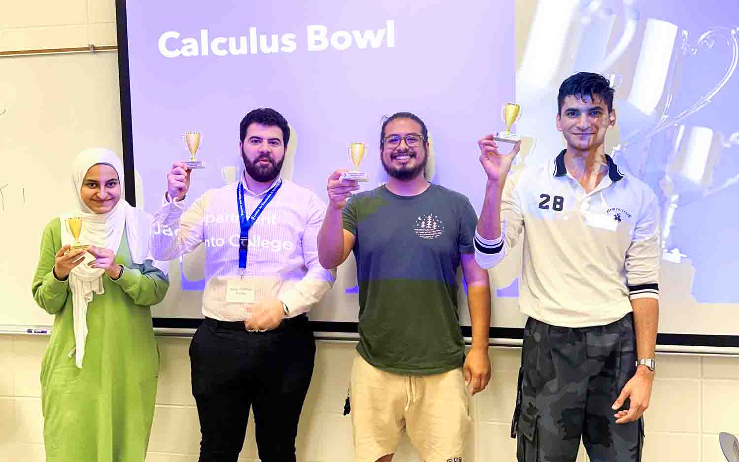 Calculus Bowl winners from left to right: Habiba Mansour, Abdel Rahman Rabata, Jesse Mata, and Syed Hammad Ali Rizvi.